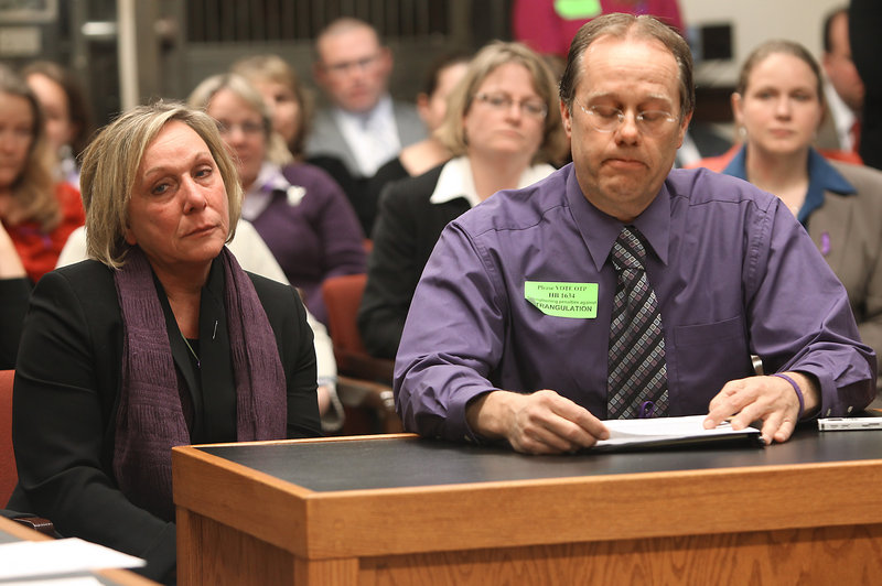 With his wife, Claire, beside him, John Cantin, whose daughter was killed by her estranged husband at her Manchester, N.H., home last year, testifies Tuesday for a bill that would make strangulation a felony-level crime.