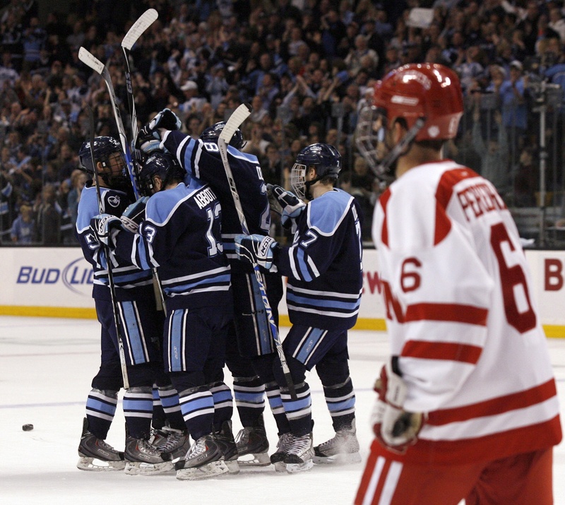 UMaine celebrates Brian Flynn’s goal during the first period of Friday’s Hockey East semifinal against Boston University at TD Garden in Boston. The Black Bears withstood a third-period rally by the Terriers, holding on for a 5-2 win