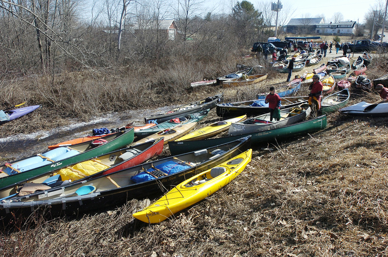 More than 100 of the canoes and kayaks registered to participate in this year’s race gather along the riverbank in Searsmont for the March 27 contest.