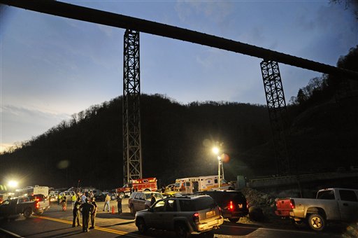 West Virginia State Police direct traffic at the entrance to Massey Energy's Upper Big Branch Coal Mine Monday, April 5, 2010 in Montcoal, W.Va. (AP Photo/Jeff Gentner)