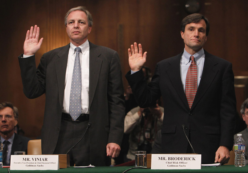 Goldman Sachs Executive Vice President and Chief Financial Officer David Viniar, left, and Chief Risk Officer Craig Broderick are sworn in on Capitol Hill today, prior to testifying before the Senate Investigations subcommittee hearing on Wall Street investment banks and the financial crisis.