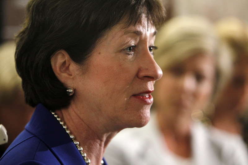 Sen. Susan Collins, R-Maine, speaks to reporters Monday after a private meeting with Treasury Secretary Timothy Geithner regarding financial reform at her office on Capitol Hill.