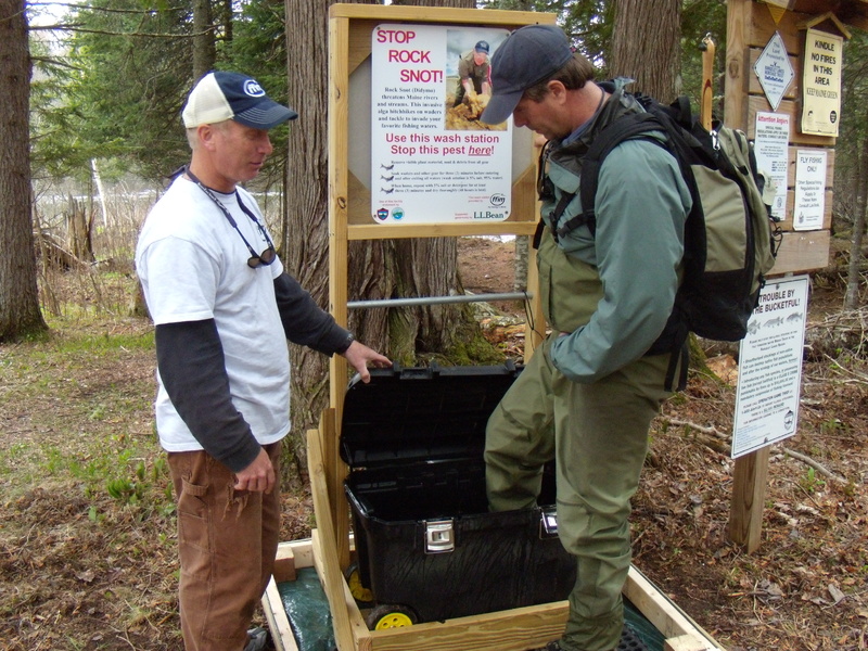 A wash station at the Rapid River last year. At rivers around Maine, fly fishermen will be asked and encouraged to clean up to keep the invasive algae didymo from gaining a foothold in the state. Didymo is in New Hampshire, New York and several other states.