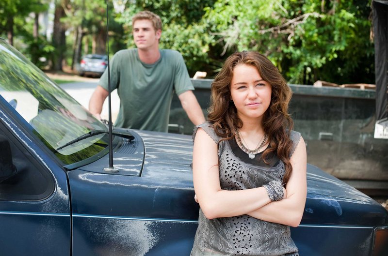 Miley Cyrus and Liam Hemsworth have good chemistry in “The Last Song.”