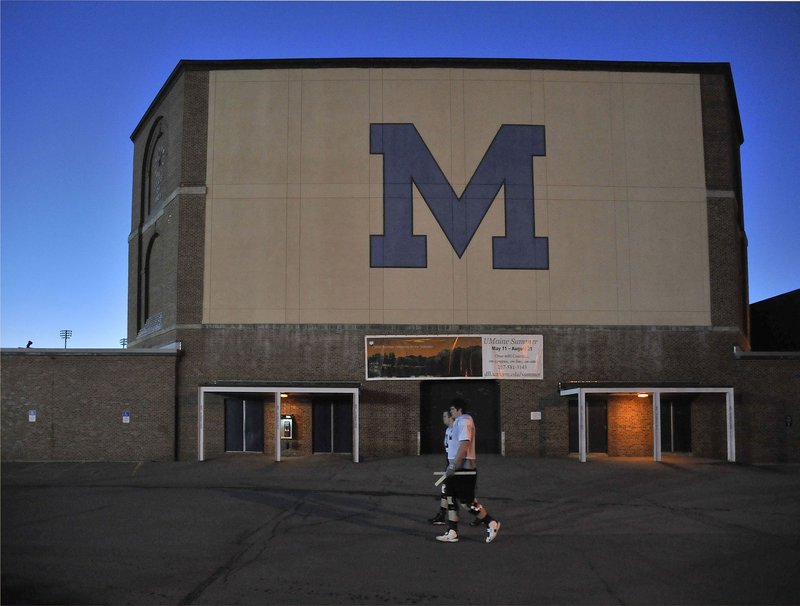 Students pass the UM fieldhouse on their way to practice. The school is vital to Maine's future prosperity, readers say.