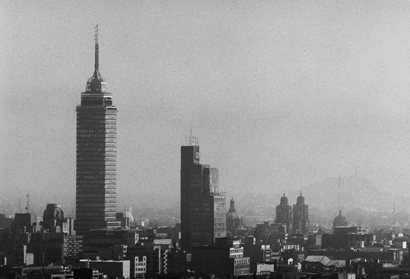 A curtain of smog enveloped the Latin American Tower, left, and surrounding Mexico City skyline in this 1998 photo. In 1992, the United Nations declared Mexico City the most polluted on the planet. Today, efforts to reduce emissions are being hailed as a model for rapidly growing cities in developing nations such as China and India.