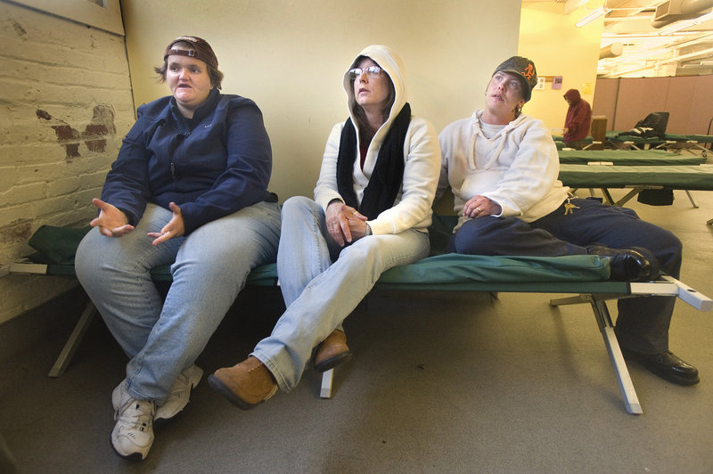 Women who have been staying at the Preble Street shelter are looking forward to this week’s move to Florence House. They say they are most excited about having a bed and a place to leave their belongings. From left are Shellie Duncan, Brenda Biggs and Kaylah Stowell.
