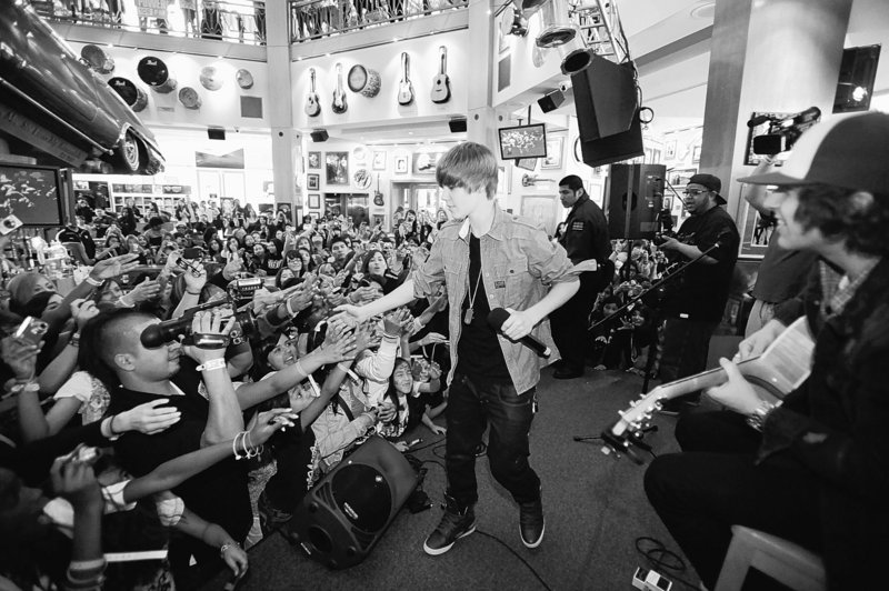 Canadian pop singer Justin Bieber performs as part of the March on Stage benefit concert series at the Hard Rock Cafe in Los Angeles on Friday. Hard Rock will donate proceeds from the events in North America to Musicians on Call, an organization founded with the mission of bringing live and recorded music to the bedsides of patients in health-care facilities.