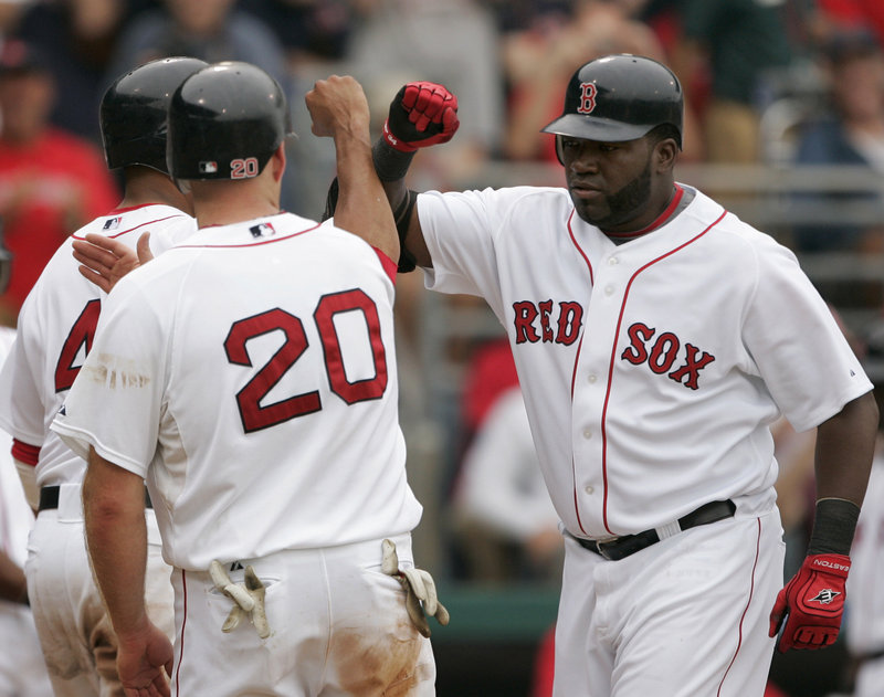 David Ortiz, right, had a horrible first two months last season, then reverted to form over the final four months. How Ortiz does on an offense that has the possibility of stumbling may determine just how far the Red Sox are able to go this season.