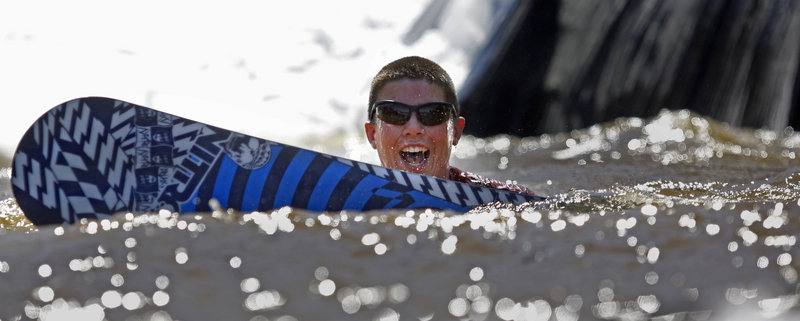 Kyle Hannon, 14, of Salem, N.H., ends his ride in the pond.