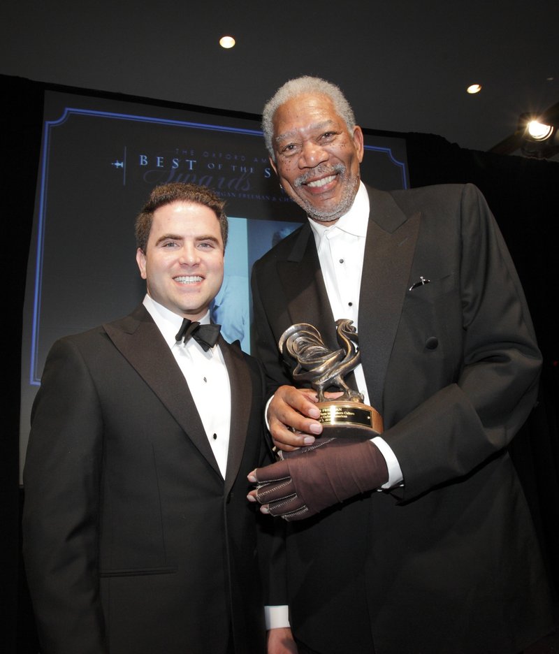 Oxford American Publisher Warwick Sabin presents the Oxford American award for outstanding contribution to southern culture to actor Morgan Freeman at the Best of the South Gala in Little Rock, Ark. Saturday.