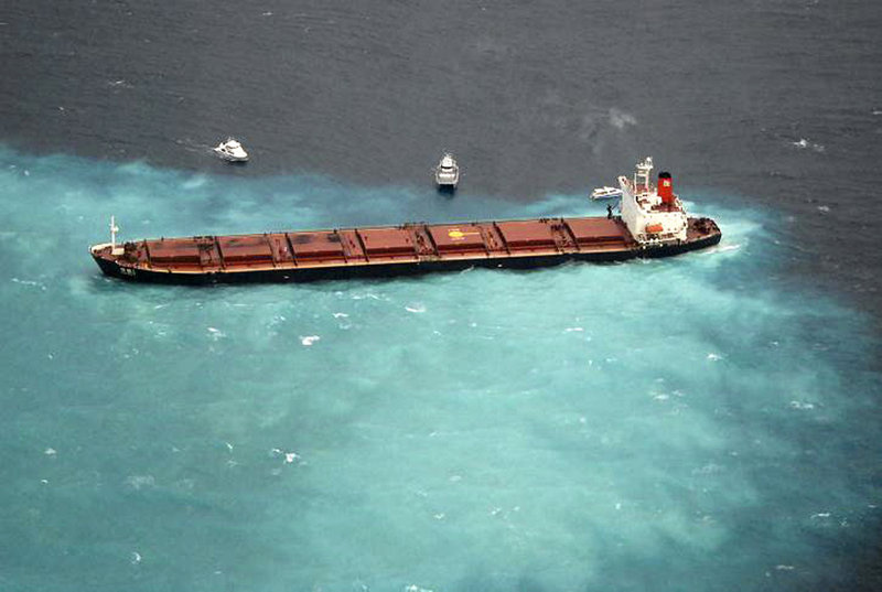 The Chinese coal-carrying ship Shen Neng 1 is hard aground and leaking oil on Australia’s Great Barrier Reef on Sunday.