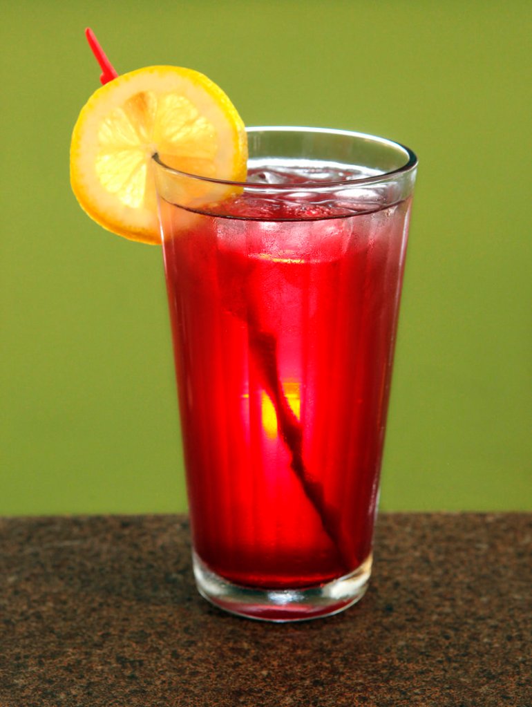This colorful concoction, created by Jo Moser of the Greenlight Studio and Cafe in Portland, is made with 100 percent pomegranate juice, seltzer and a slice of lemon, served on the rocks.