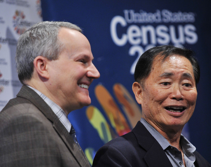 Actor George Takei, right, and his husband, Brad Altman, speak at a news conference Monday in New York. The Census Bureau unveiled public service videos encouraging gays and lesbians to mail in their census forms.