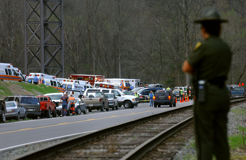 Authorities survey the scene of an explosion that killed 12 miners Monday at the Upper Big Branch mine in Montcoal, W.Va. The Massey Energy Co. underground coal mine has had three other fatalities in the past dozen years.