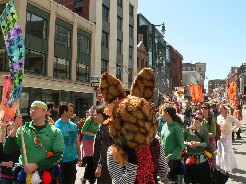 Last year's Ebune paraders form a colorful procession through downtown Portland as they celebrate spring. This year's event starts at noon Sunday.