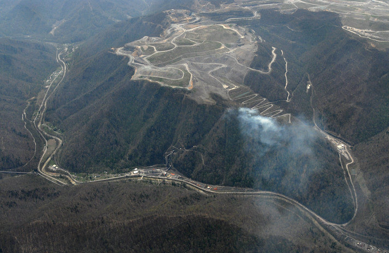 The Massey Energy Complex near Montcoal, W. Va, is seen in an aerial photo on Wednesday. A Massey executive said Thursday that more drilling is needed to help clear a West Virginia mine of dangerous gases.