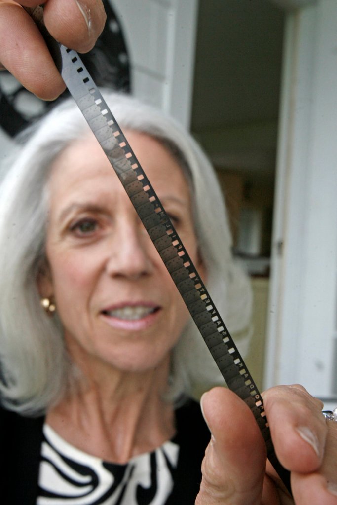 Susan Cooke Kittredge is overseeing the viewing of the 11-minute 8mm home movie featuring Charlie Chaplin made by her father, Alistair Cooke, in the 1933.