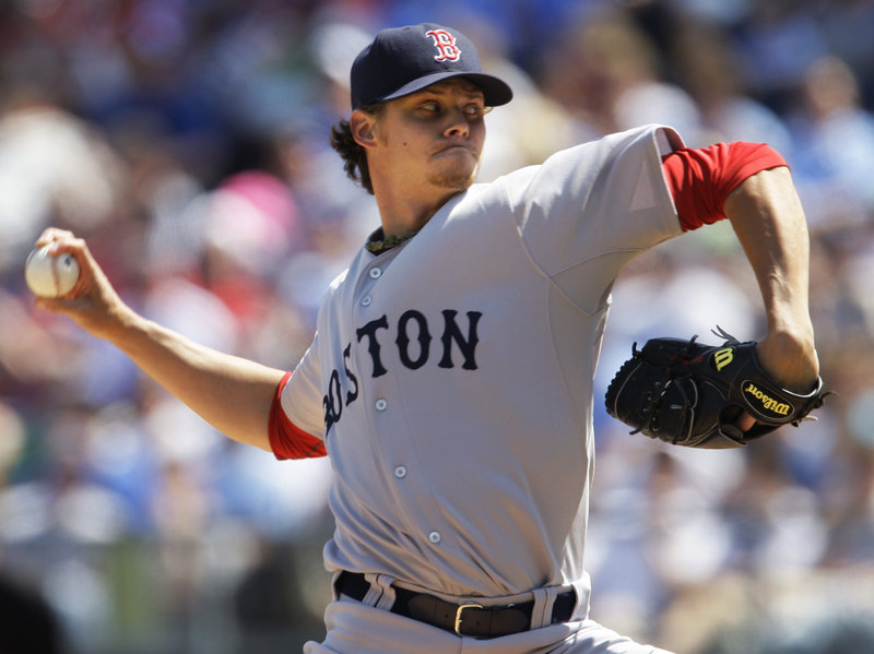 Clay Buchholz got a win in his first start of the season for the Red Sox after giving up two earned runs and seven hits in five innings as Boston beat Kansas City, 6-4.