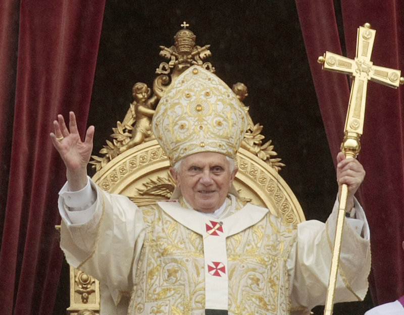 Pope Benedict XVI waves to the crowd at the end of the Easter Mass in St. Peter’s Square on April 4. The Vatican has announced that the pope is willing to meet with more sex abuse victims in an effort to take part in the healing process.