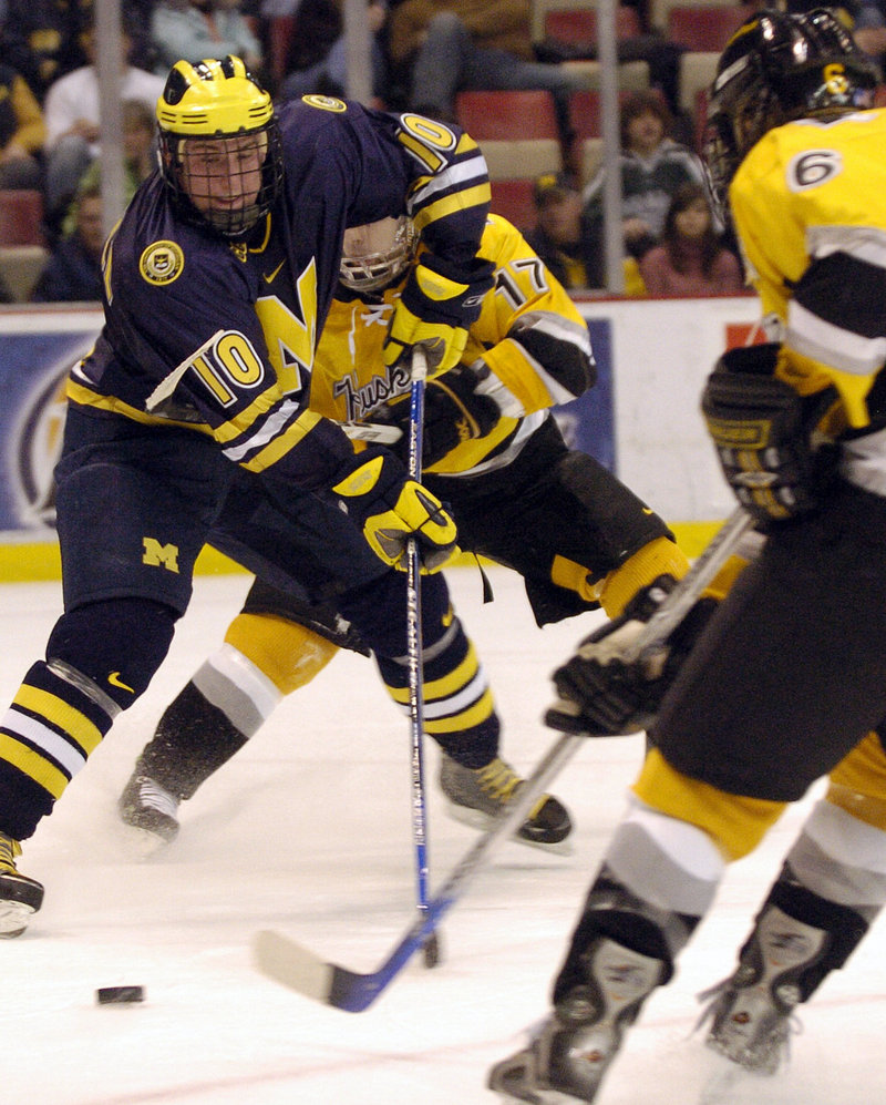 Travis Turnbull played for the Portland Pirates while he still had four courses remaining toward a defree at Michigan.