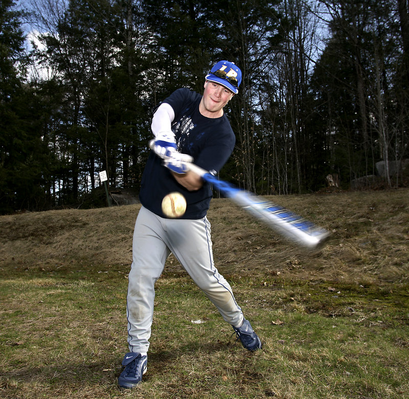 Danny Place, a junior catcher, uses an aluminum bat as a power hitter for Lake Region High, but also travels to play in a wooden-bat league in Massachusetts.
