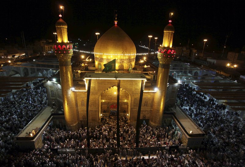 The Associated Press One line for cutline goes to book asjfl;kjasd FILE - In this Thursday, Sept. 10, 2009 file photo, Shiites gather at the holy shrine of Imam Ali to mark the last days of the Muslim holy month of Ramadan in Najaf, 160 kilometers (100 miles) south of Baghdad, Iraq. Iraqi and U.S. security officials say Iraqi forces have disrupted an al-Qaida plot to hijack airliners and fly them into Shiite holy shrines. They say the plan was to carry out a 9/11-style attack aimed at re-igniting sectarian violence in Iraq. (AP Photo/Alaa Al-Marjani, File)lk;fkjasdl;kjf