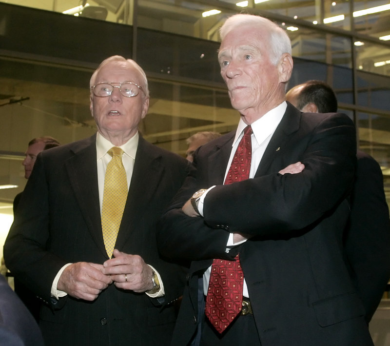 Astronauts Neil Armstrong, left, and Eugene Cernan – the first and last men on the moon – talk during a reception in Armstrong’s honor at Purdue University in West Lafayette, Ind. in 2007.