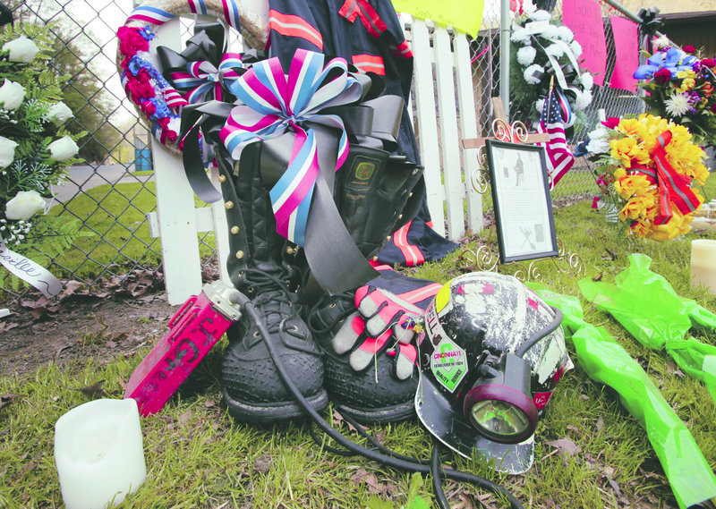 A miner’s boots, helmet and gloves appear in a makeshift memorial in Whitesville, W.Va., on April 13 for the miners who died in an explosion at Massey Energy Co.’s Upper Big Branch mine in Montcoal, W.Va. Many Americans’ ideas of coal mining are drawn from the gritty portrayals of Hollywood, yet modern coal mining is a high-tech industry that provides the fuel for about half of U.S. electrical production.