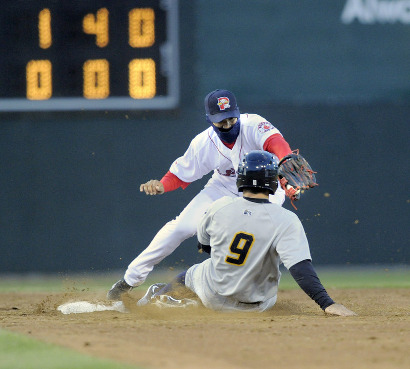 Austin Krum of the Trenton Thunder is forced at second as shortstop Jose Iglesias takes the throw in the fifth inning.