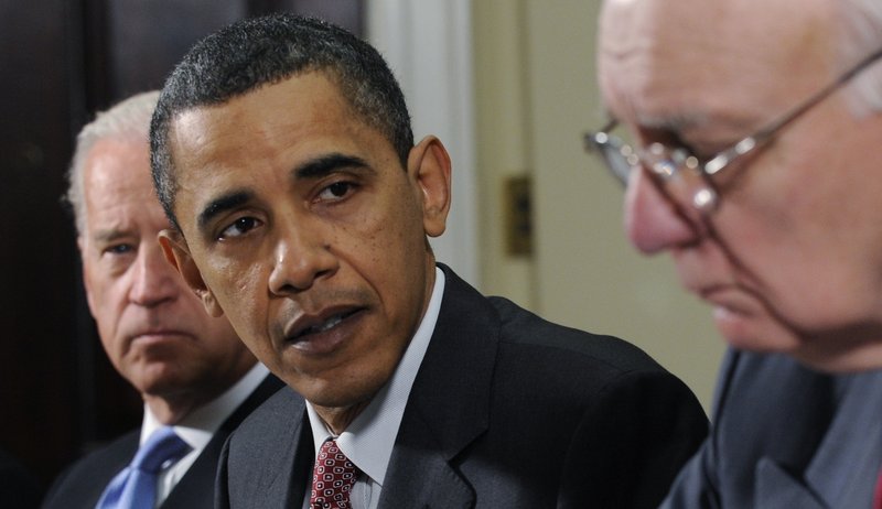 President Obama looks to Paul Volcker, chairman of the President’s Economic Recovery Advisory Board, as Vice President Joe Biden looks on at left, on Friday during a meeting at the White House. The White House is preparing a major financial system overhaul.