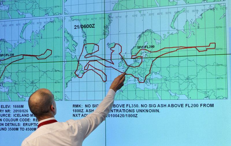 A member of the German Air Traffic Control center crisis management group near Frankfurt, Germany, points at a map showing the estimated size and direction of the volcanic ash cloud over Europe. It is expected 55 to 60 percent of flights over Europe will be flying today, but the volcano’s influence could create turmoil again.