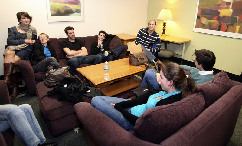 French students hang out in the School of Law lounge. They have visited Portland Head Light in Cape Elizabeth, eaten at various restaurants and homes, and found some great deals while shopping in Freeport.