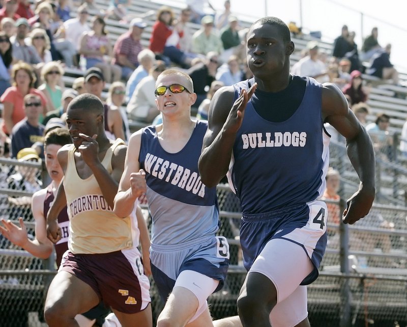 Imadhi Zagon of Portland, right, won the 100, 200 and long jump at last year's Class A state meet.