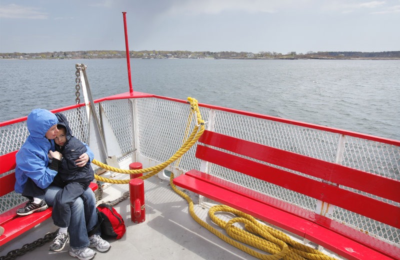 Laura Ruel and her son Curtis, 6, ride the Island Romance to Peaks Island on Wednesday. Casco Bay LInes was awarded $5.5 million to build a new ferry to replace the 65-foot vessel, but the grant is for a 110-foot boat that isn’t designed to carry cars.