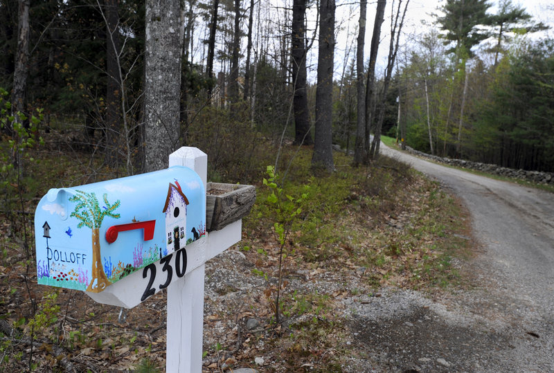 The Dolloff property on Dolloff Road in Standish, with its colorful mailbox, is shown Friday. Prosecutors say Linda Dolloff beat her husband, Jeffrey, severely with a baseball bat on April 12, 2009, then shot herself and called 911 to report a home invasion.