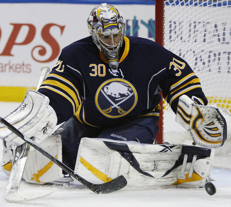 Ryan Miller makes one of his 34 saves for the Sabres Friday night in a 4-1 win over the Bruins at Buffalo, N.Y. The first-round series returns to Boston for Game 6 on Monday, with the Bruins leading 3-2.