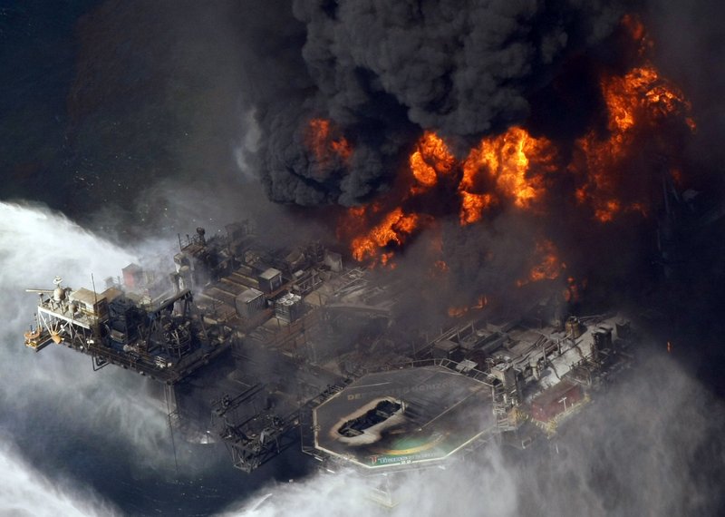 The Deepwater Horizon oil platform burns in the Gulf of Mexico some 50 miles southeast of Venice, La., on Wednesday. On Friday, the Coast Guard suspended its search for 11 workers who had been missing since an explosion took place aboard the structure Tuesday.