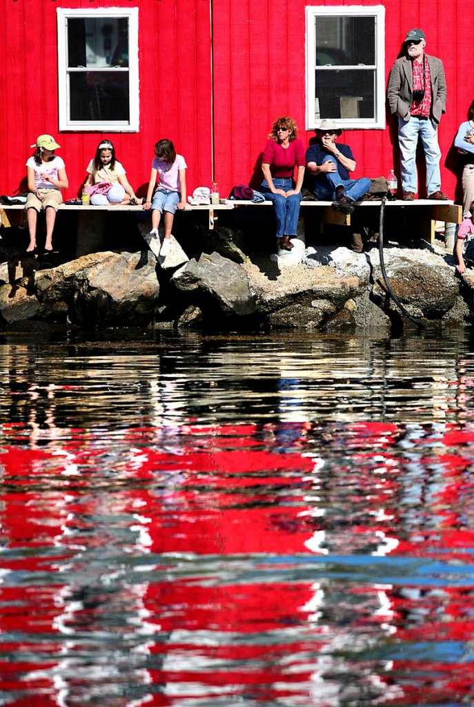 Spectators watch the trap-hauling competition during the 37th annual Fishermen’s Festival in Boothbay Harbor Saturday.