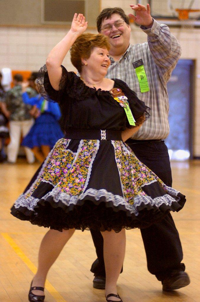 Fred Rick of Vernon, Conn., twirls his dance partner, Judy Plantier, also of Vernon, during the 52nd annual New England Square and Round Dance Convention in Biddeford Saturday. The gathering started Thursday night and wraps up with the Trail-out Dance at 9 a.m. today.