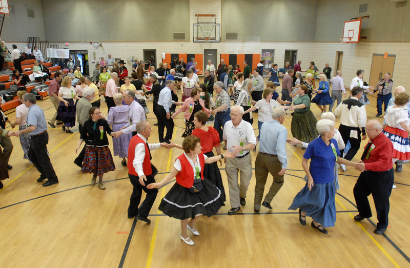 Participants hit the floor at the New England Square and Round Dance Convention in the Biddeford Intermediate School gym Saturday. Running counter to the trend of falling participation is a Brunswick-based club that does round dancing, like the waltz.