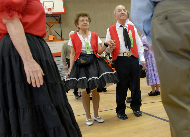Leo and Josephine Thibodeau of Waterbury, Conn., line up with dance partners during the 52nd annual New England Square and Round Dance Convention in Biddeford.