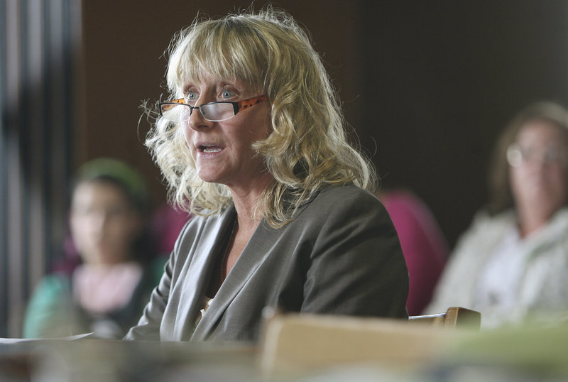 Marie Veselsky of Plymouth, N.H., who has spent eight months on antibiotics for Lyme disease, testifies before a state Senate panel Monday in favor of a bill to allow long-term antibiotic treatment for Lyme disease without board disciplinary action.