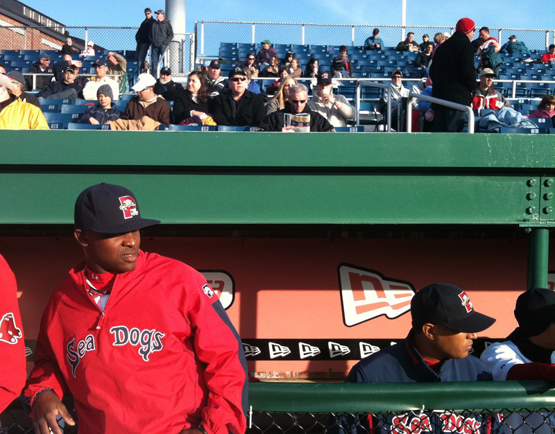 Pitcher Jason Rice, left, waits for the start of the Sea Dogs game tonight against the Trenton Thunder. The Dogs are coming off a season-opening, weeklong road trip with a 4-3 record.