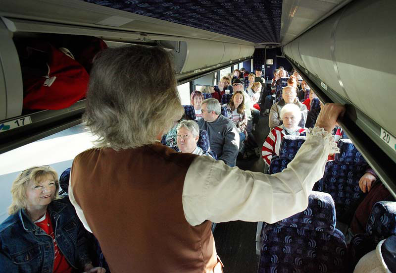 On a bus traveling to Boston on this morning, Jeff Cucci talks to Mainers traveling to a Tea Party rally where Sarah Palin was scheduled to speak to supporters. Cucci spreads his message by playing the role of Jacob Broom, a state legislator from Delaware who signed the U.S. Constitution in 1787.