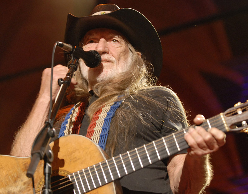 Willie Nelson performs with his band during the Farm Aid Concert in St. Louis in 2009.