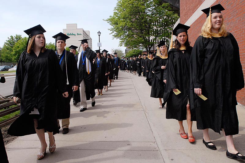 University of New England Graduates march into the Cumberland County Civic Center for Commencement today.