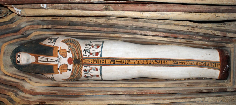 A painted wooden sarcophagus is shown in a photo released by the Egyptian Supreme Council of Antiquities on Sunday. It was discovered in Lahoun, where archaeologists have unearthed 57 ancient Egyptian tombs, with the oldest dating back to around 2750 B.C. and 12 belonging to the 18th dynasty which ruled Egypt during the second millennium B.C.