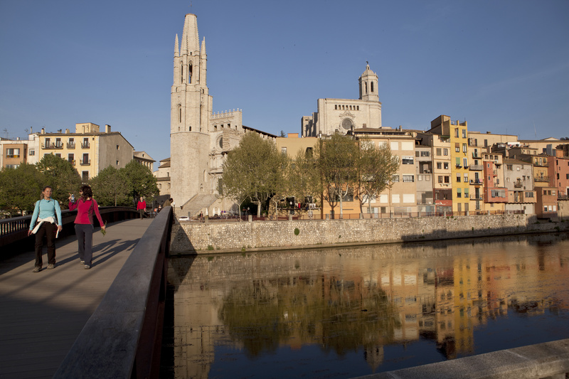 Church towers rise above the River Onyar in the ancient Spanish city of Girona, which recently rediscovered its old Jewish quarter and rebuilt part of its medieval ramparts. SPAIN GIRONA EUROPE FOOD CUISINE