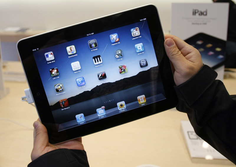 Apple sold 1 million of its new iPad tablet computers in the month after its launch, more than twice as fast as the iPhone did when it was new.
